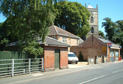 Outwell Goods Office (fgnd) and St. Clements Church (c.Rudi Newman)