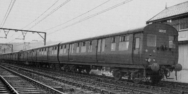 Glossop stock as delivered and unpainted in the early 1950s, at Glossop signal box
