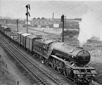 Gresley V2 2-6-2 No. 4938 pulling goods through Newark, 1939